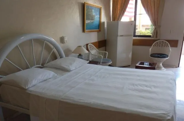 Hotel Garant Suites Boca Chica chambre 1 grand lit