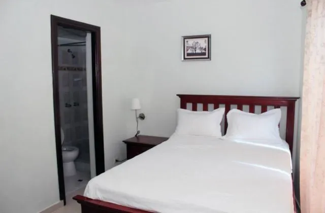 Hotel Renacer Santo Domingo chambre 1 grand lit